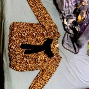 Lightly worn, leopard print, very light weight
